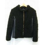 A lamb wool and leather jacket, size small, some wear to sleeve lining.