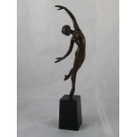 Tom Merrifield. "Solitude" A bronze naked girl dancer representing solitude.