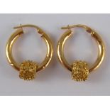 A pair of 9 carat gold hoop earrings, approx 2 cm diameter, 3.6 gms.