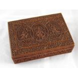 An Indian hardwood box finely carved overall, with lock and key. 21x15x6.5cm. high.