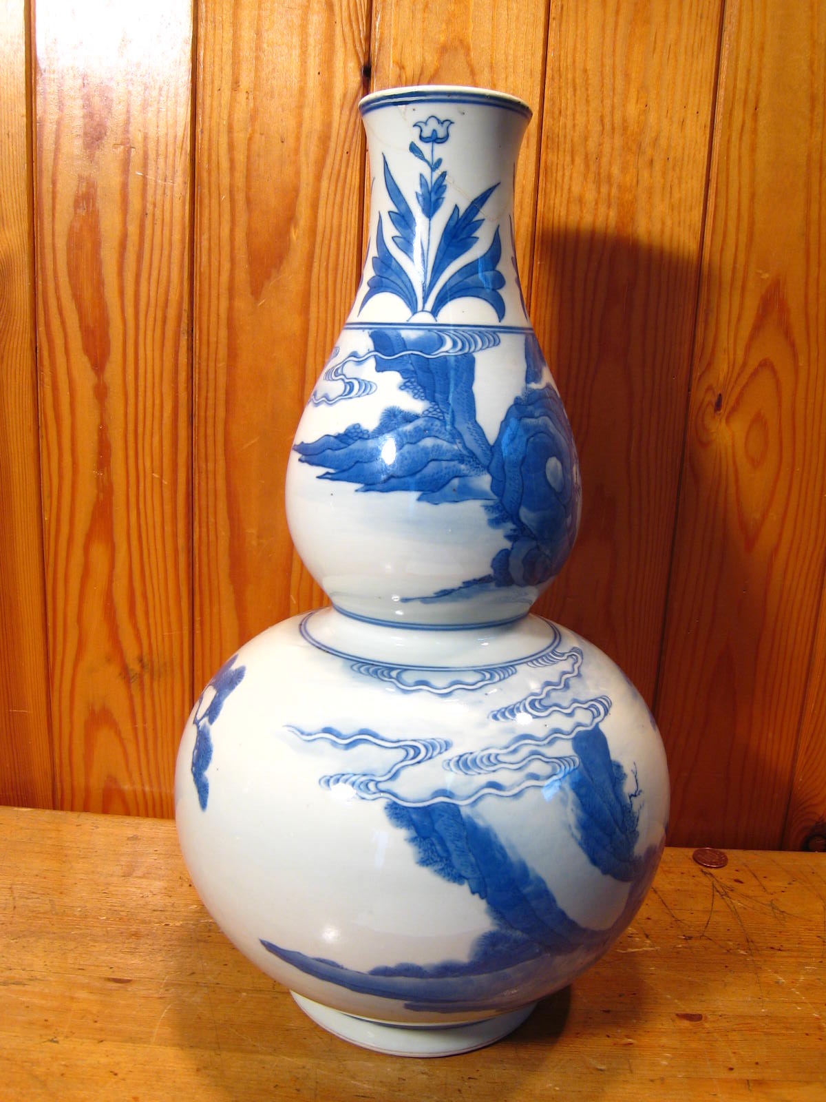 A 20th century double gourd shaped Chinese vase with landscape in blue and white. Ht.39cm. Repaired. - Image 13 of 17