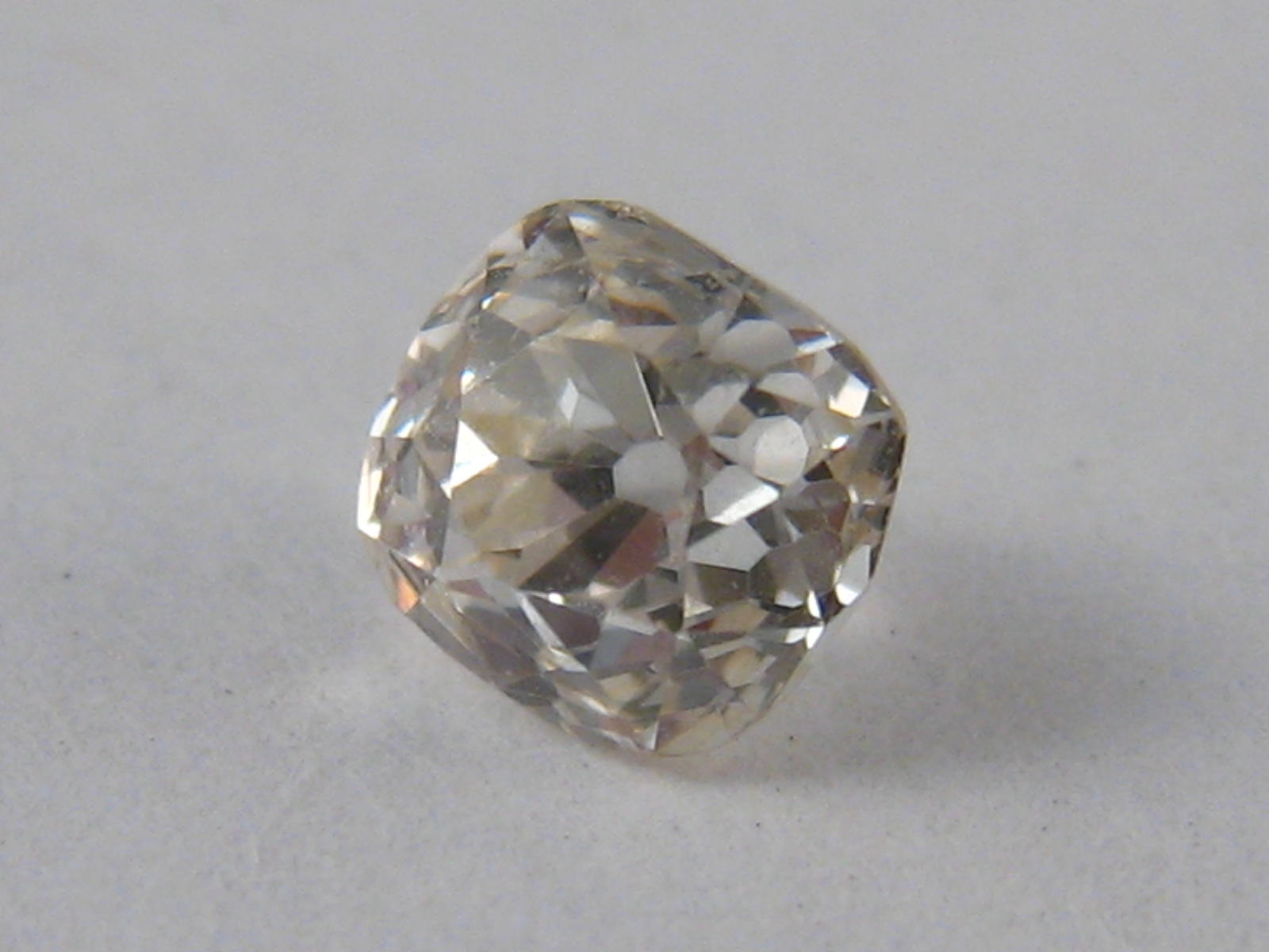 A loose polished round briliant cut diamond, weight approx. 0.