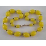 A bead necklace. Longest bead approx. 17mm, approx 41cm long.