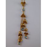 An 18 carat gold blue topaz and diamond , floral design pendant necklace, pendant approx 6cm,