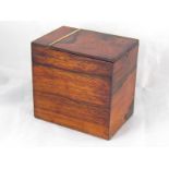 A Regency rosewood tea caddy with original foil lining and hinged lid. 14x9x13cm. high.