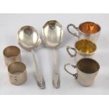 Three small silver cups, each German 800 assay, two continental silver spoons, 833 assay,