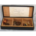 A box contaning a mixed lot of military brass buttons, pre 1947 British "silver " coinage,