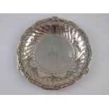 An antique Continental cast white metal, tests silver,