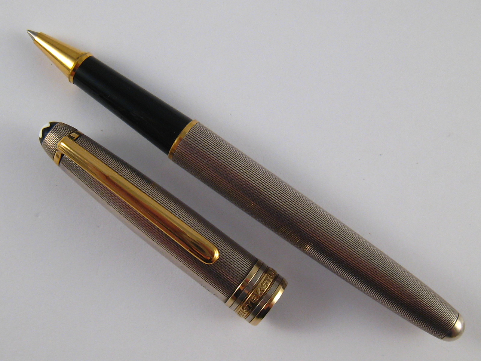A sterling silver Montblanc Meisterstuck ballpoint pen with gilt clip.