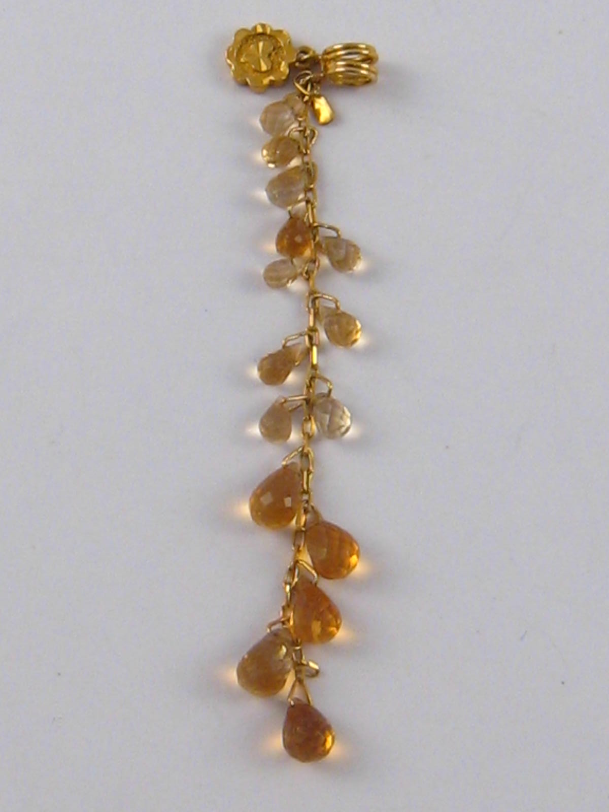 A yellow metal (tests 18 carat gold) citrine pendant, approx 7cm, 3.2 gms.