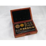 A mahogany, velvet lined, box of Hatton Garden jeweller's weights with a few additions.