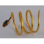 A fine antique French 18 carat gold serpent bracelet, of coiled sprung design,