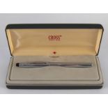 A boxed Cross fountain pen including cartridges and papers.