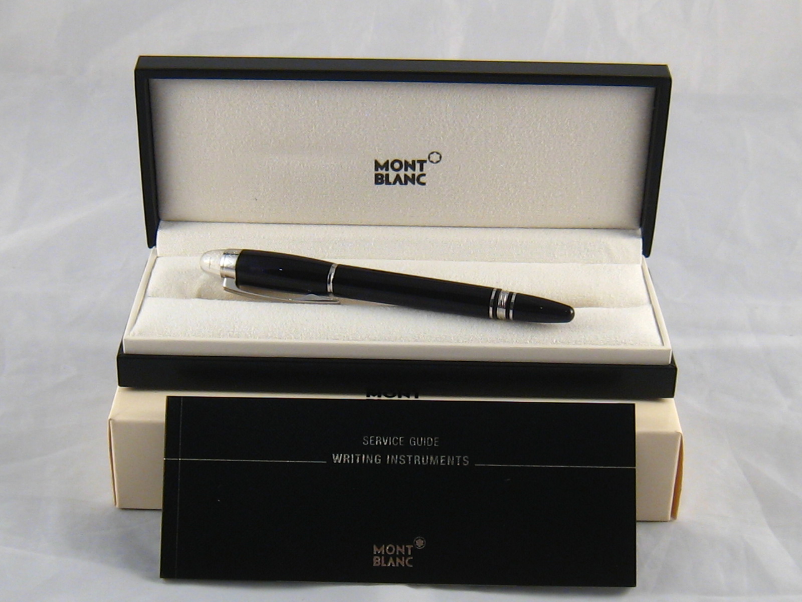 A Mont Blanc Starwalker ballpoint pen in presentation case with service guide and original box.