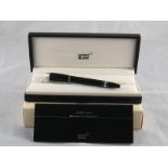 A Mont Blanc Starwalker ballpoint pen in presentation case with service guide and original box.