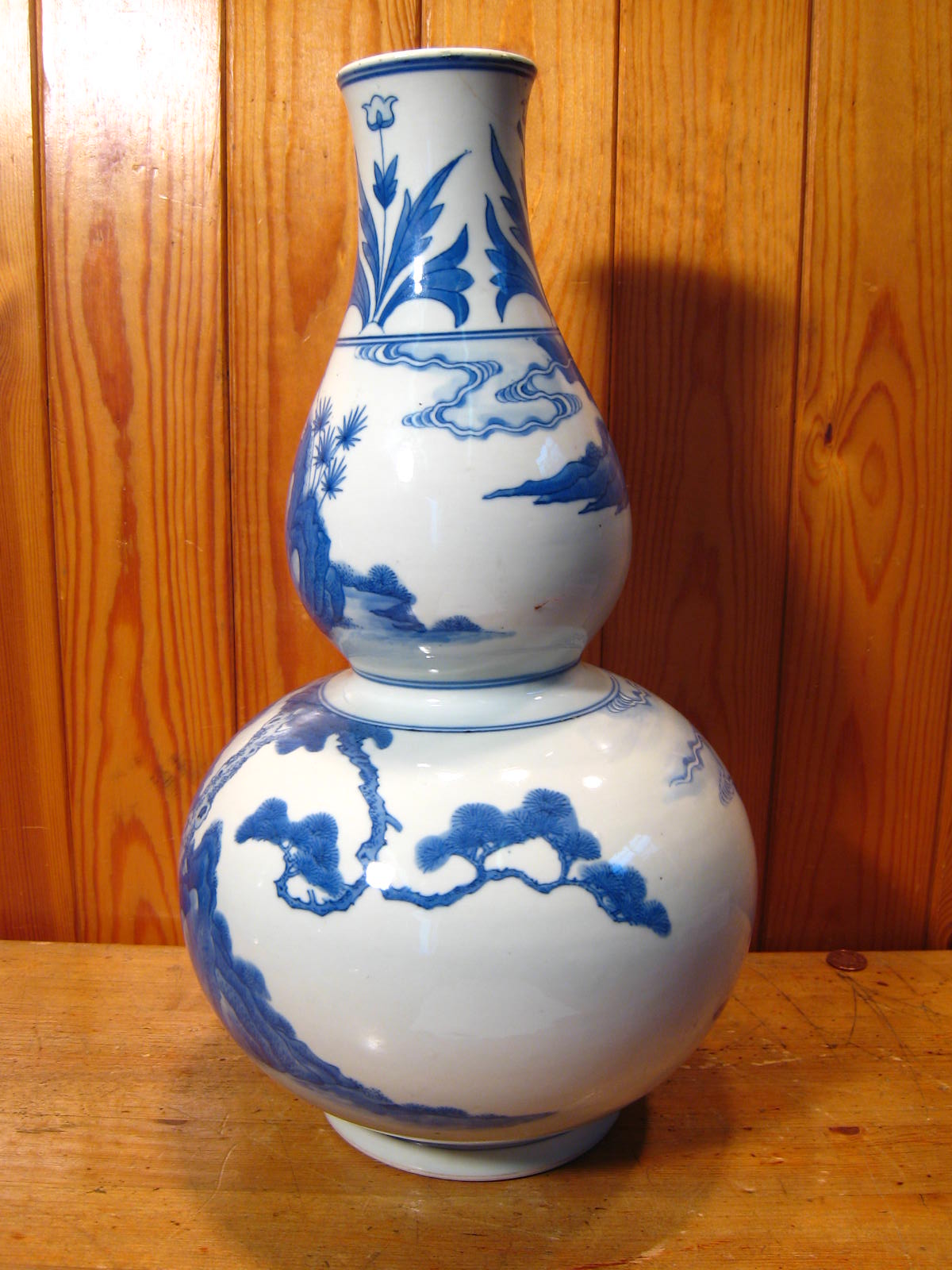 A 20th century double gourd shaped Chinese vase with landscape in blue and white. Ht.39cm. Repaired. - Image 2 of 17