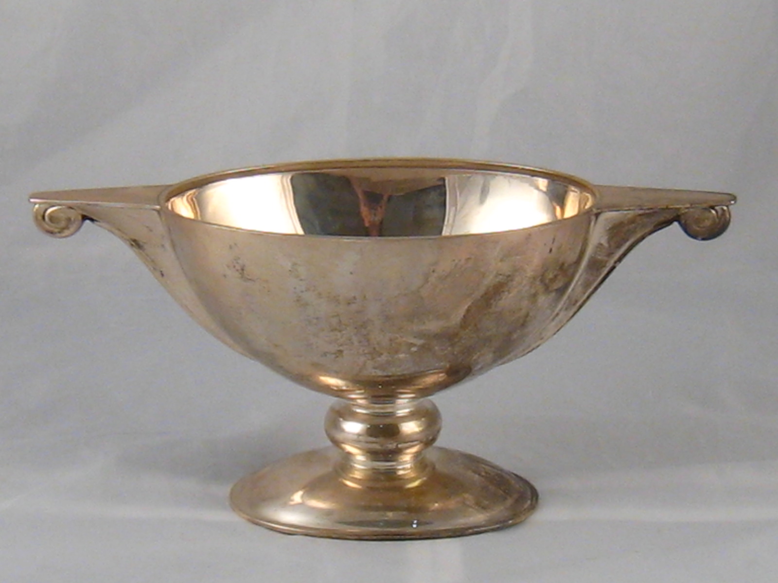 An Art Deco two handled silver bowl on foot, Birmingham, 1947. 24cm. across x 11cm. high.  wt.