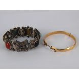 A mixed lot comprising a white metal (tests silver) bracelet set with semi precious stones,