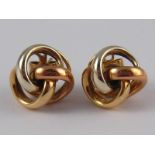 A pair of three colour 9 carat gold knot earrings, approx 1cm wide, 7.6 gms.