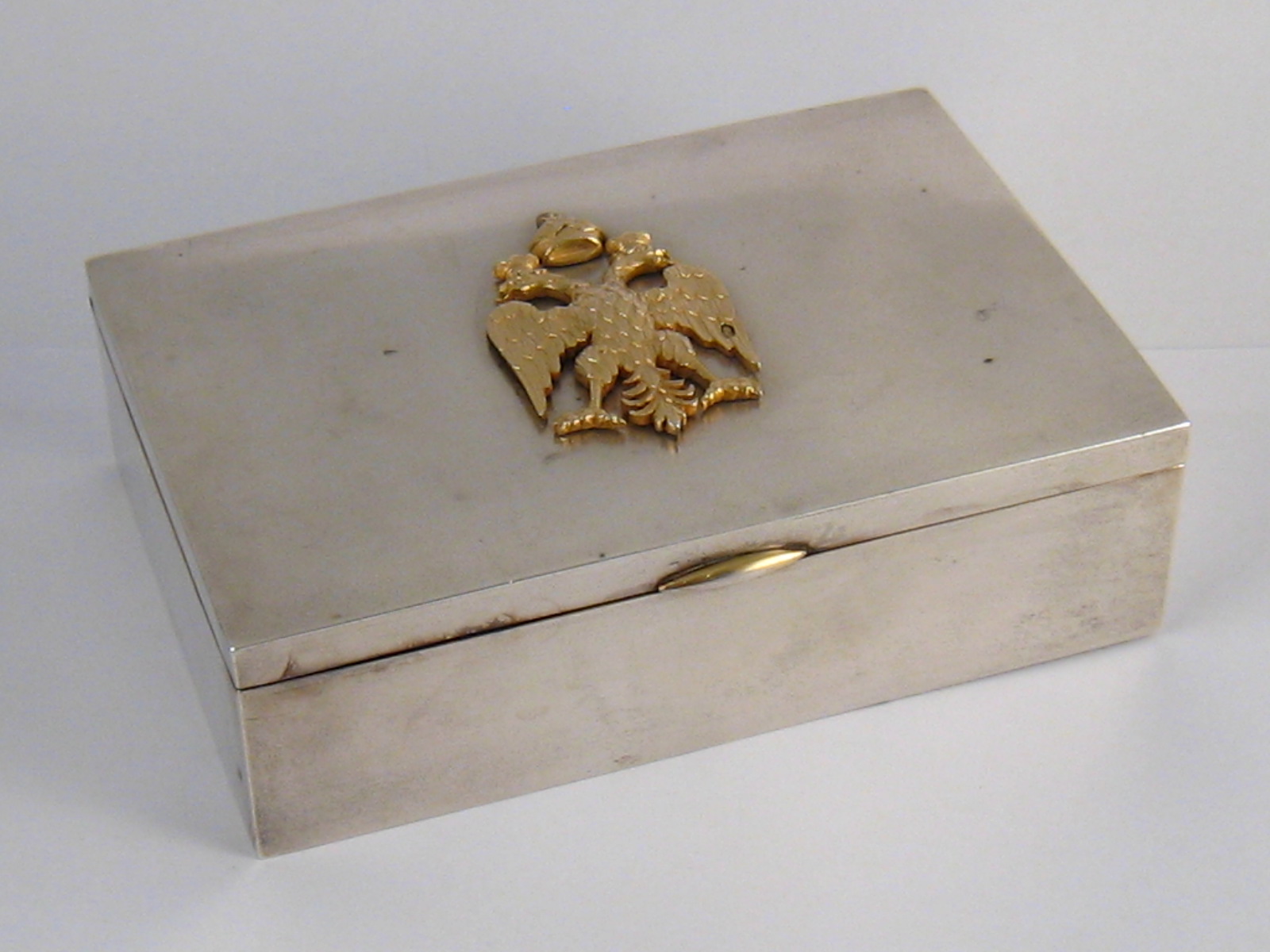 A Russian silver cigarette box, matt finish, gilt lined,