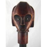 Tribal Art . A Fang tribe reliquary head mounted on an iron stand. Ht. 48cm.