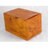 A Russian spalted birch box with integral hinged lid, 8x12.5x7.5cm.high.