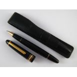 A Montblanc Meisterstuck ballpoint pen with engraved initilas AG, in leather case.