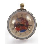 An anodised brass mounted glass ball button wind clock with central picture of a lady,