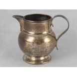 A silver cream jug by Alfred, Francis and Arthur Pairpoint, London, 1919. Wt. 171gm.