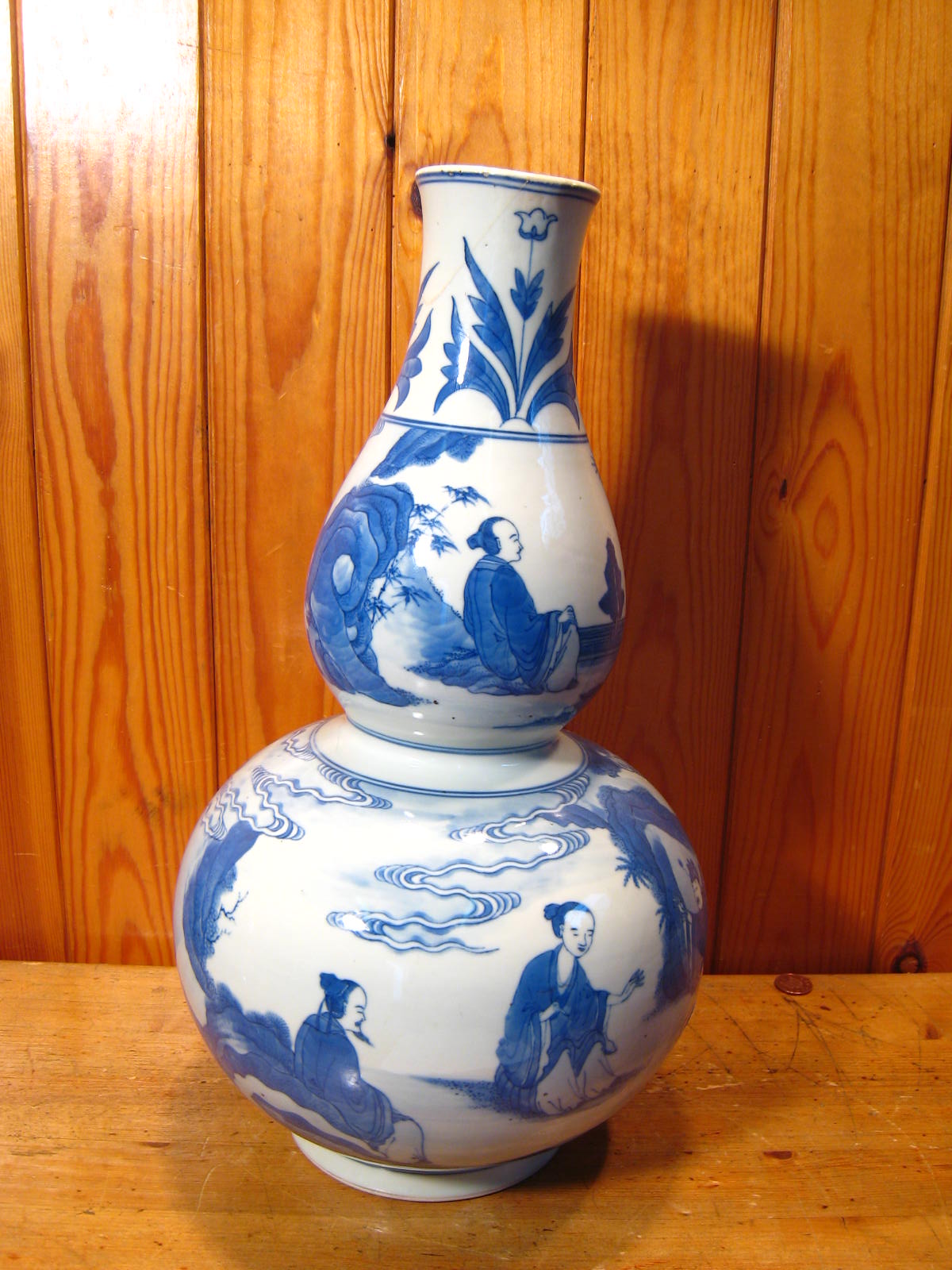 A 20th century double gourd shaped Chinese vase with landscape in blue and white. Ht.39cm. Repaired. - Image 4 of 17