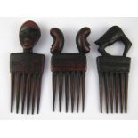 Tribal Art . Three hardwood combs, Dan tribe, Ivory coast.