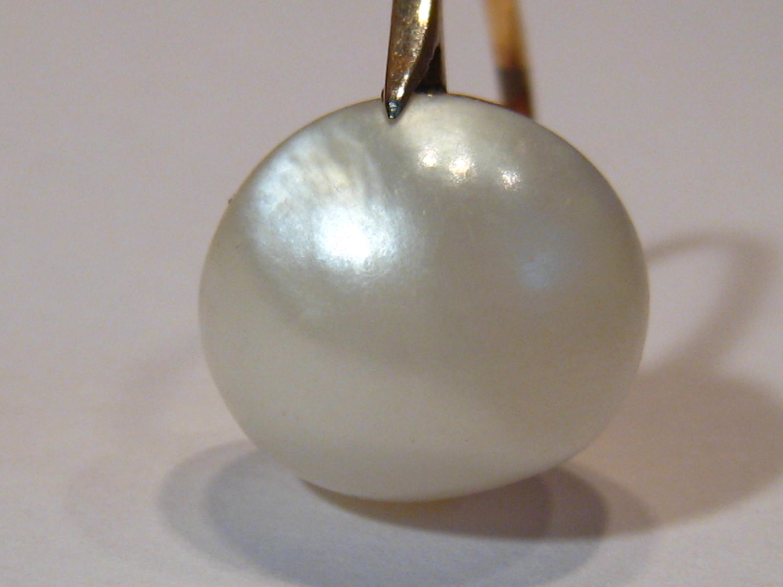 A yellow metal (tests 9 carat gold) untested baroque pearl ring, pearl approx 14mm long, - Image 2 of 6