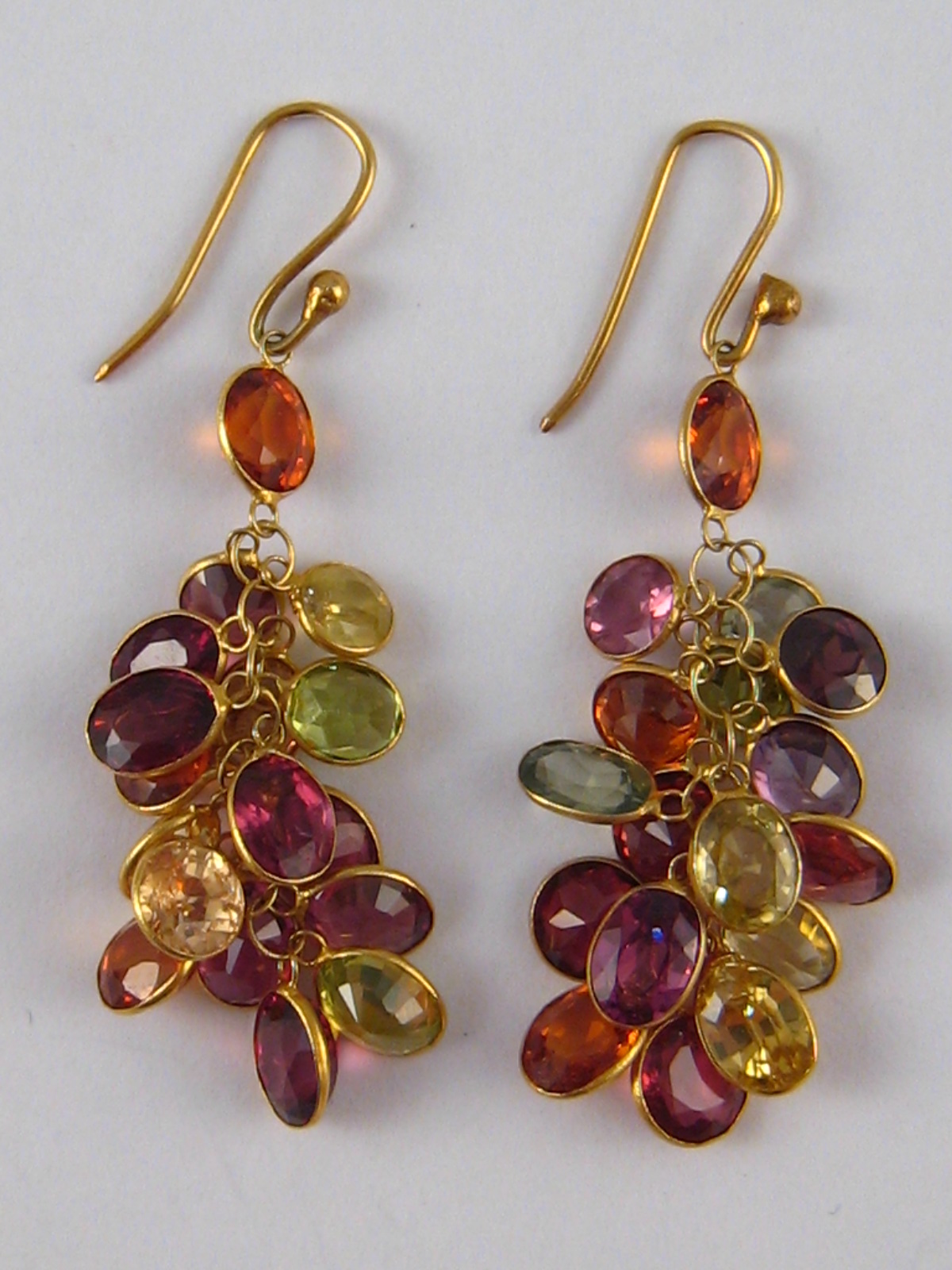 A pair of yellow metal (tests 14 carat gold) multi gem “tutti frutti” drop earrings, approx 4.