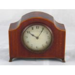 An Edwardian inlaid mahogany key wind mantel clock on brass feet. 18x7x14cm. high.