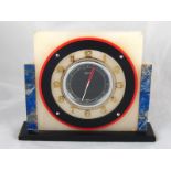 A 1930s classic Art Deco keywind Le Coultre mantel clock in contrasting colour stone,