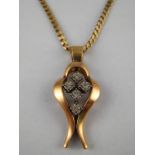 A 9 carat gold diamond pendant with 9 carat gold chain, pendant approx 3cm, gross weight 7.5 gms.