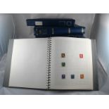 A set of twenty one matching Multo- Ring stamp albums containing an assortment of postage stamps of