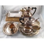 A mixed lot of silver plate, including a four piece teaset, a pair of bonbon dishes,