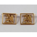 A pair of yellow metal (tests 18 carat gold) cufflinks with Ethiopian lion motif, approx 18 x 15mm,