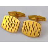 A pair of yellow metal cufflinks, marked 10ct for 10 carat gold, maker YDL, approx 19 x 16mm, 9.