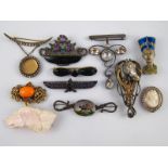 A mixed lot of good vintage brooches including a white metal (tests silver) Egyptian revival scarab