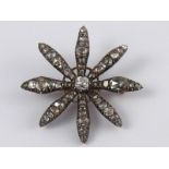 A fine antique Georgian silver and diamond brooch, with later gold pin and clasp,