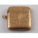 An Edwardian 9 carat gold vesta case, with finely engraved decoration, hallmarked Birmingham 1906,