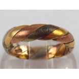 A three colour 9 carat gold band ring, approx. 4.5mm wide, ring size L, 4 gms.