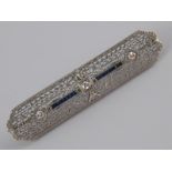 A fine Art Deco sapphire and diamond brooch, marked 14K PL for 14 carat gold and platinum,