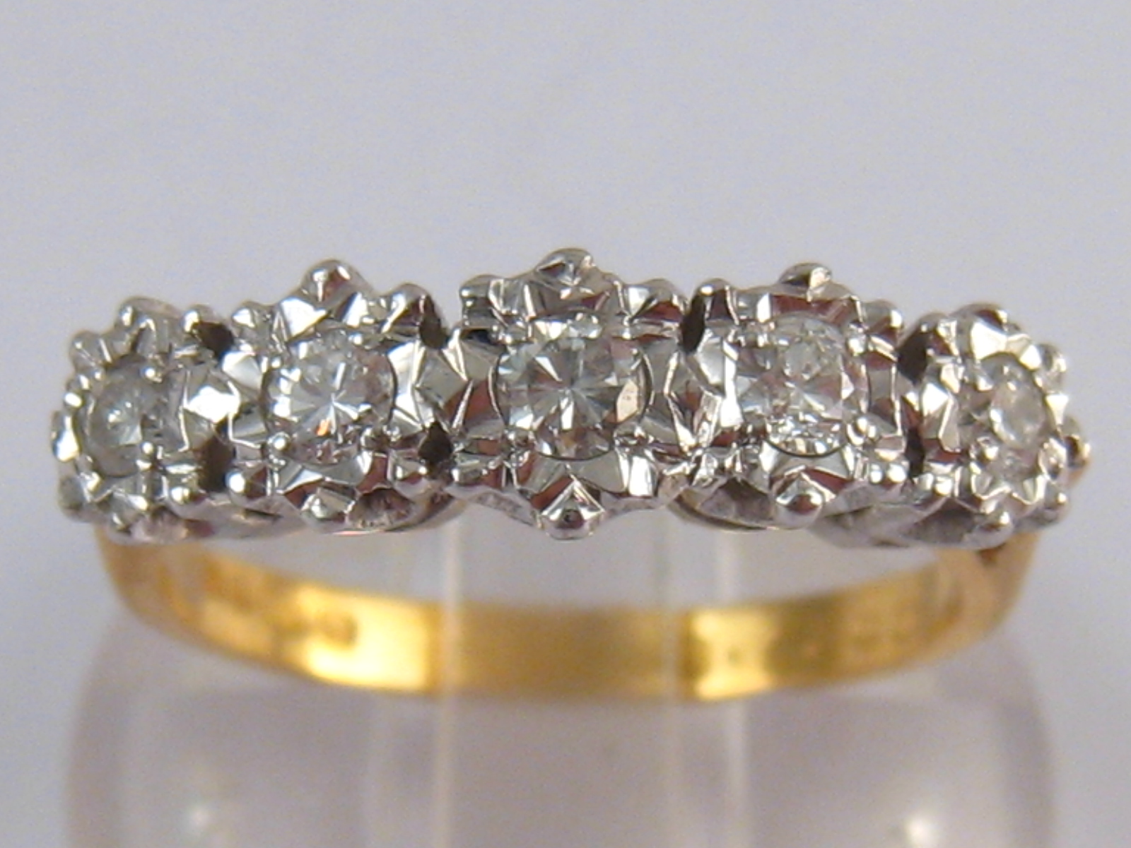 An 18 carat gold diamond five stone ring, estimated total diamond content approx 0.