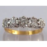 An 18 carat gold diamond five stone ring, estimated total diamond content approx 0.