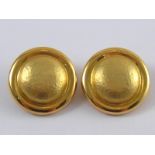 A pair of yellow metal (tests 18 carat gold) disc earrings, approx 35mm wide,