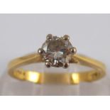 A yellow metal (tests 18 carat gold) diamond solitaire ring,