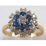 A 9 carat gold sapphire and diamond ring, size P, 3.1 gms.